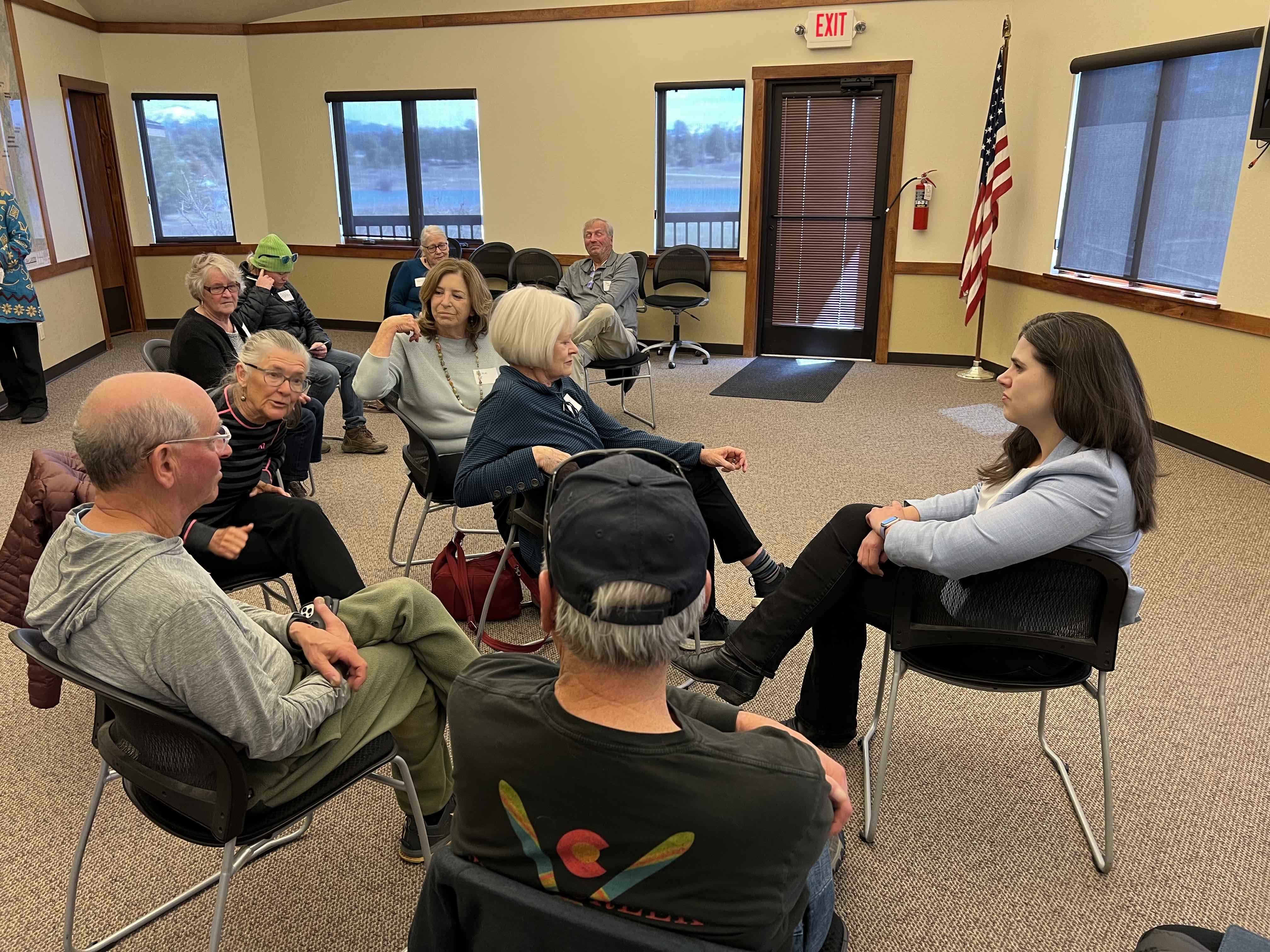 Griswold sitting with voters
